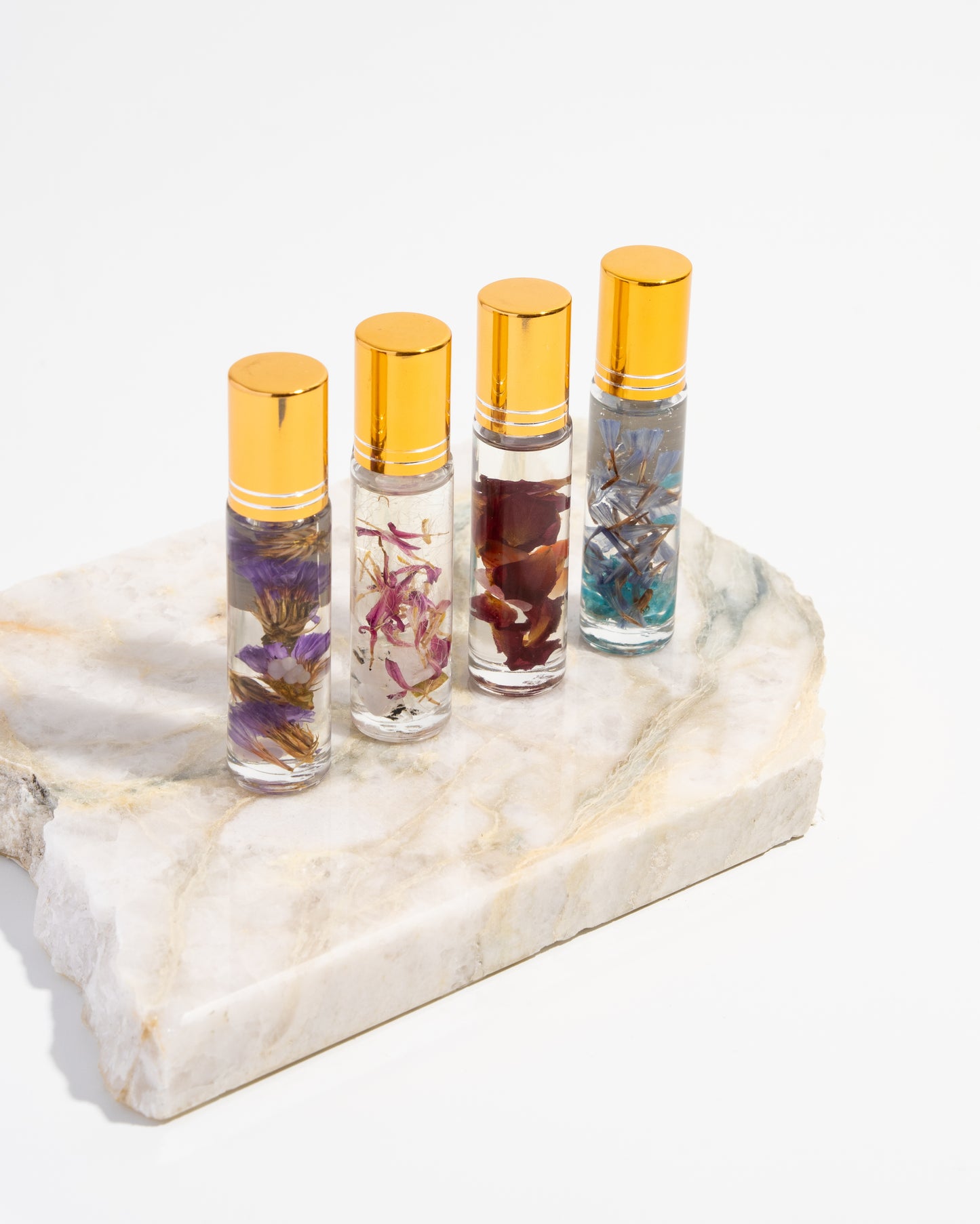 Fragrance potion gift set- All four of our floral and crystal oil roller perfumes!