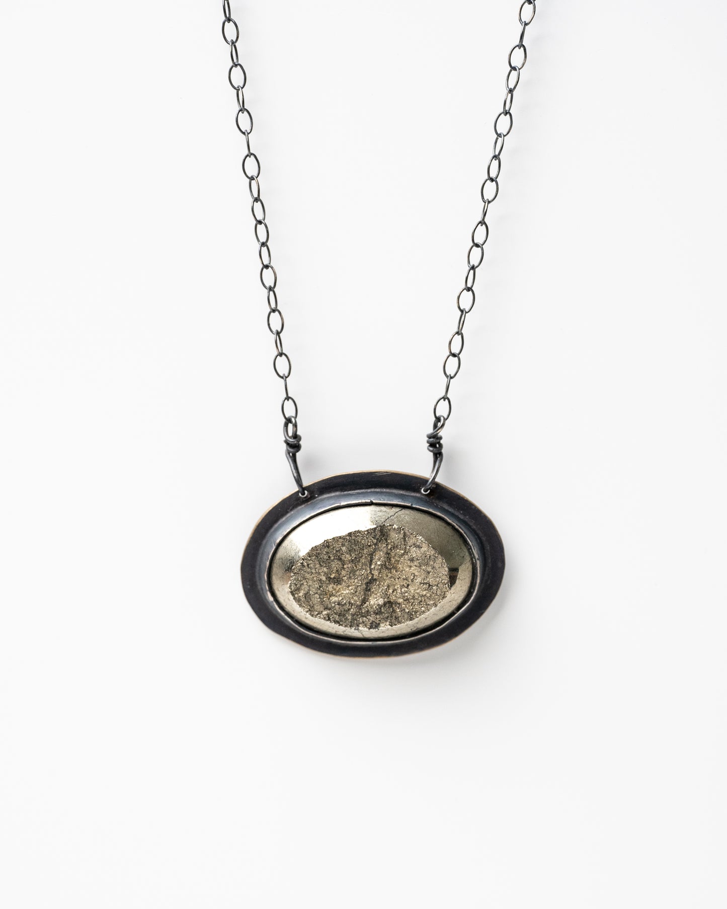 Prosperous Necklace: Handmade Sterling Silver Necklace with Half Raw Pyrite Stone