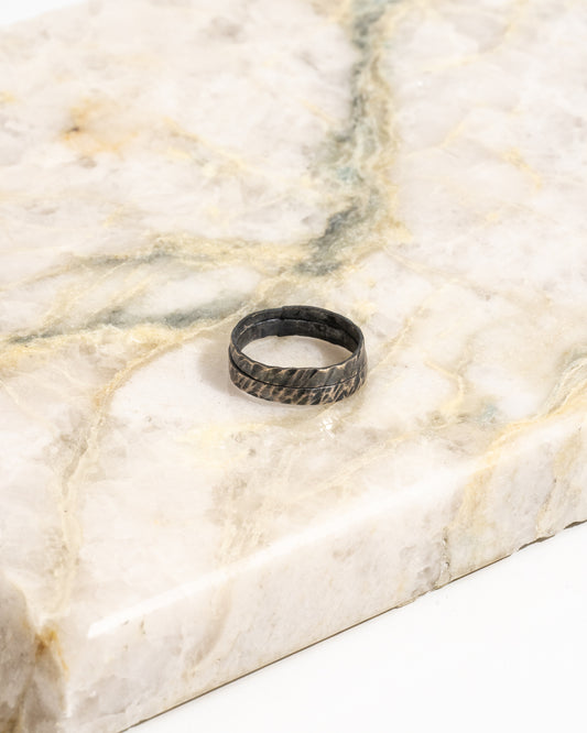 Horizon ring featuring double band with textured patina