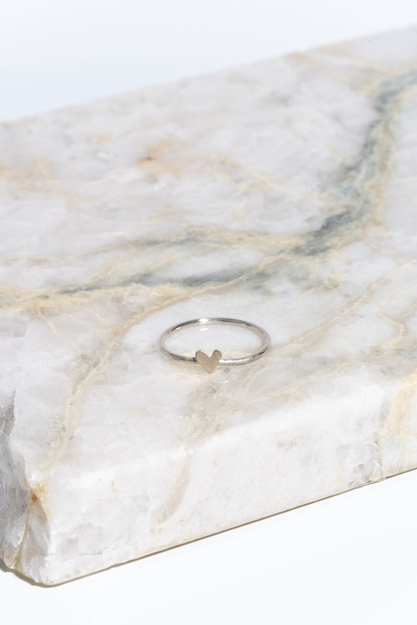 Tiny heart stacking ring in sterling silver