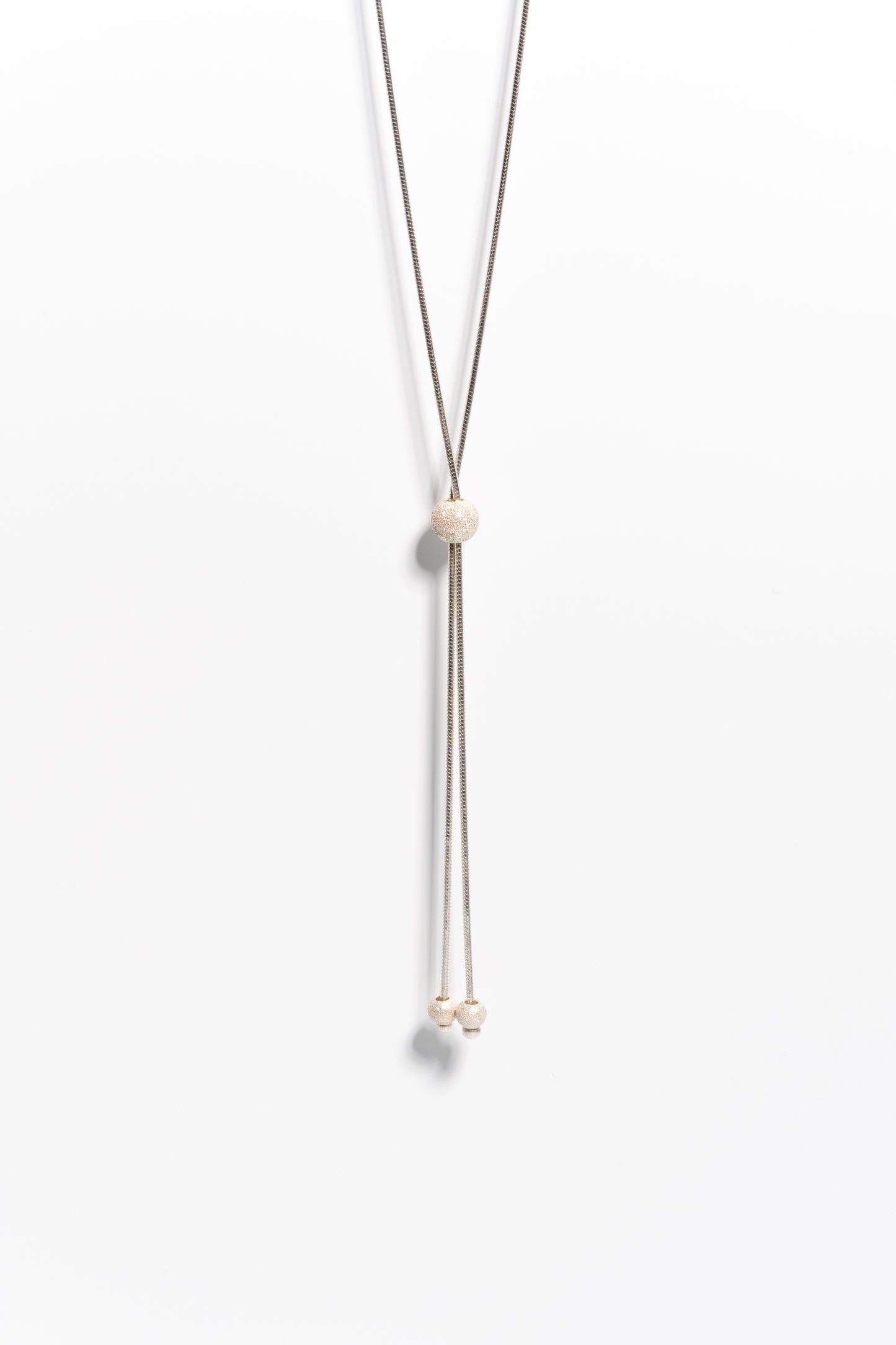 Sterling Silver Lariat Layering necklace with glistening silver beads